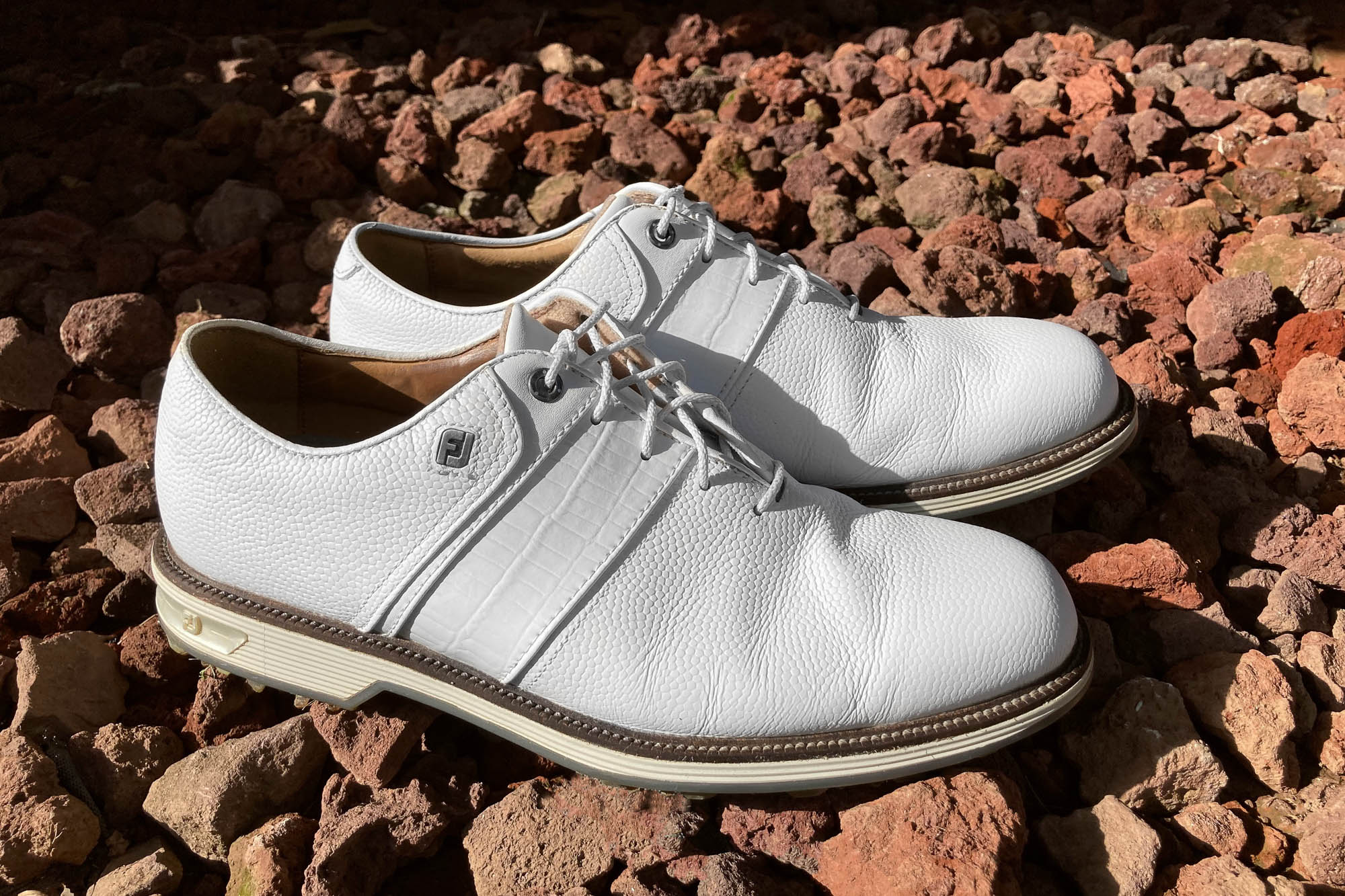 Smartphone product photography outdoors in harsh light.